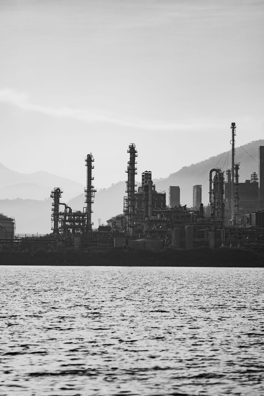 Refinery silhouette at dawn - global oil markets are watching.