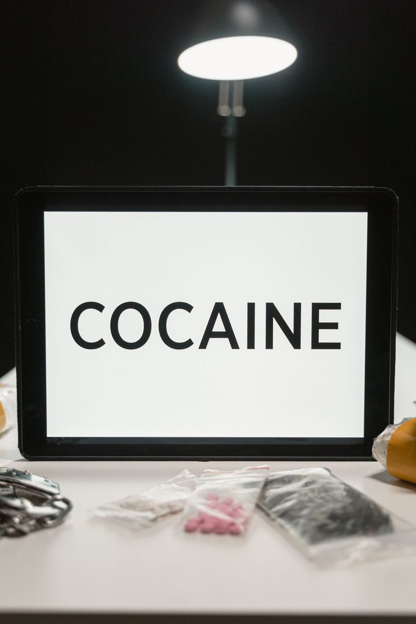 Cocaine laid out on a table — the scale of the largest seizure in Liberian history.