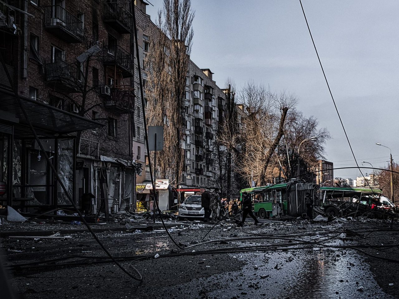 Wreckage in a city street after a strike — the daily reality of frontline towns.